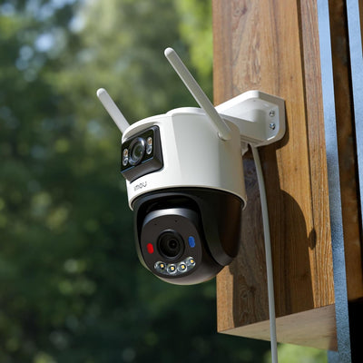 IMOU Cruiser Dual 2 mounted on a wooden exterior wall