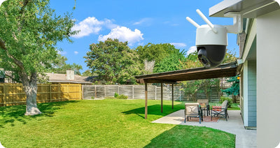 IMOU Cruiser SC 8MP PT camera mounted on a house overlooking a backyard
